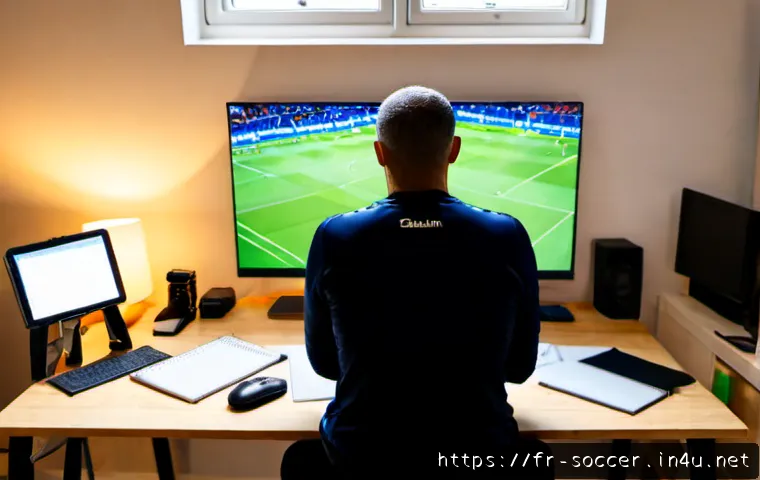 축구 경기 영상 분석 방법 - Photorealistic football match video analysis workspace in France, a focused adult coach wearing casu...